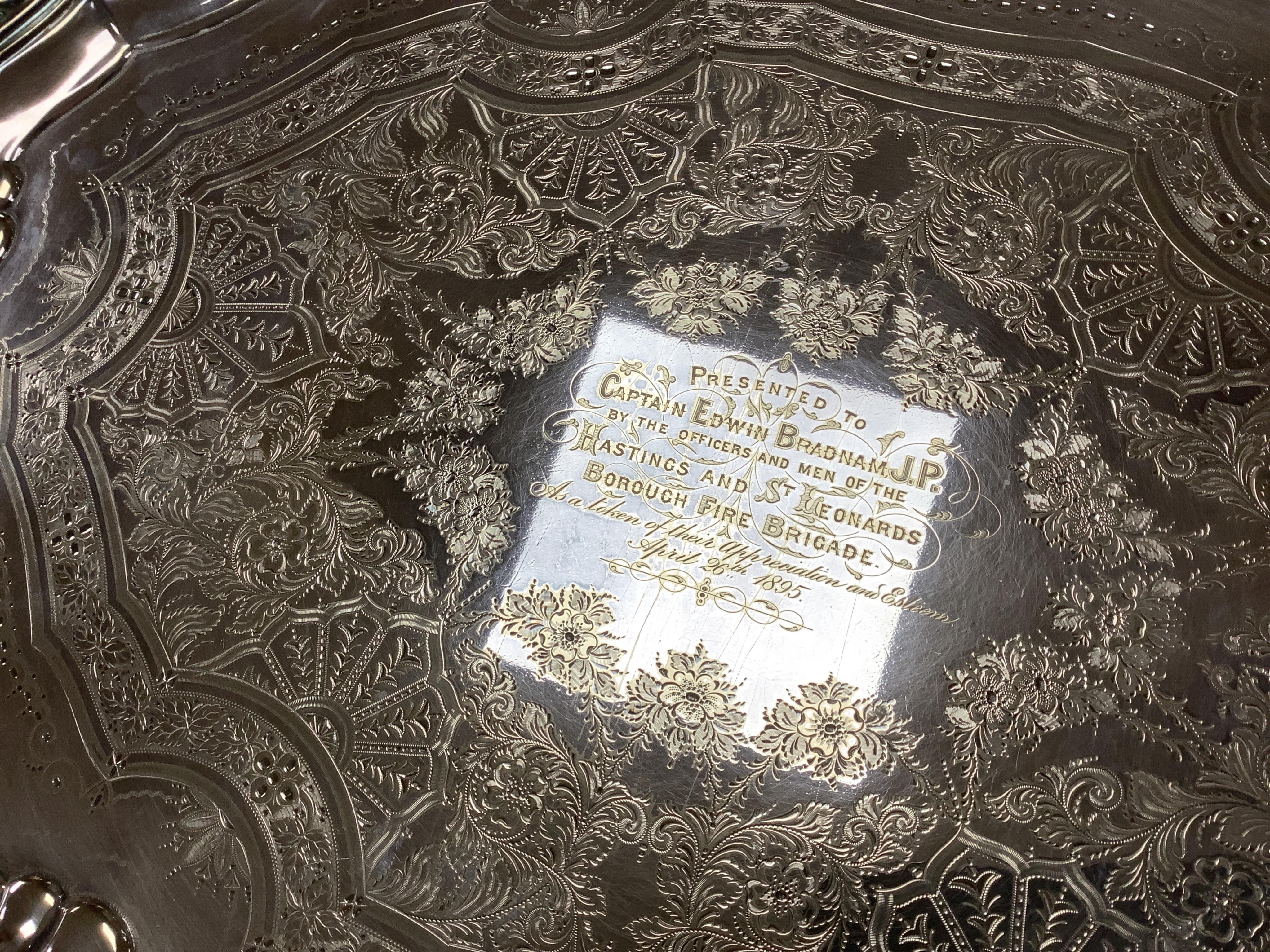 A large late Victorian plated two handled presentation tea tray, 71cm. Condition - fair